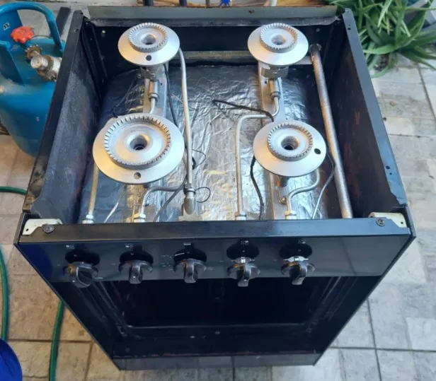 Appliance repair technician diagnosing an oven with uneven cooking temperatures in Klamath Falls, OR.