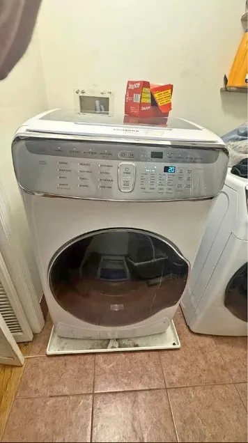 Technician repairing a washing machine that won't start in Klamath Falls, OR.